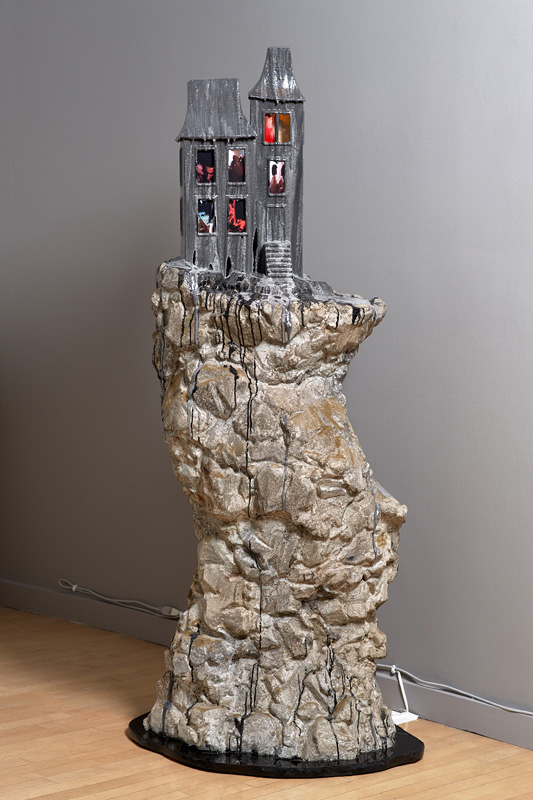 Sculpture of gothic structure on rock by Tracey Snelling