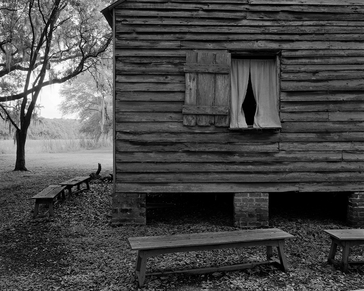 Black and white photograph of a plantation cabin