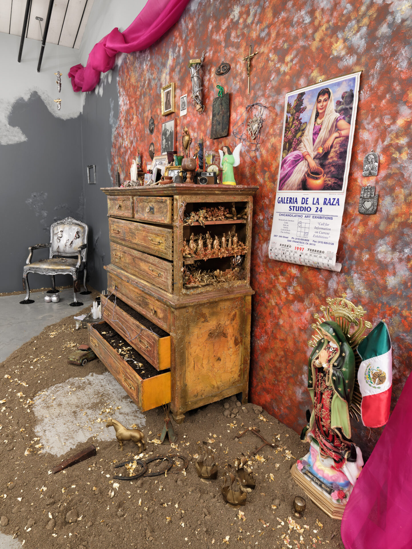 Installation view of "Emblems of the Decade: Bordes," by Amalia Mesa-Bains